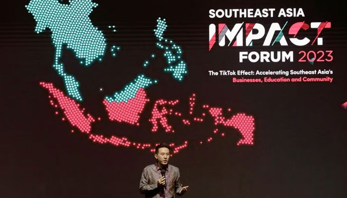 TikTok's CEO, Shou Zi Chew, takes the stage at The Ritz Carlton, Pacific Place in Jakarta, Indonesia, on June 15, 2023, during the highly anticipated launch event of TikTok's Socio-Economic Impact Report for 2023. 